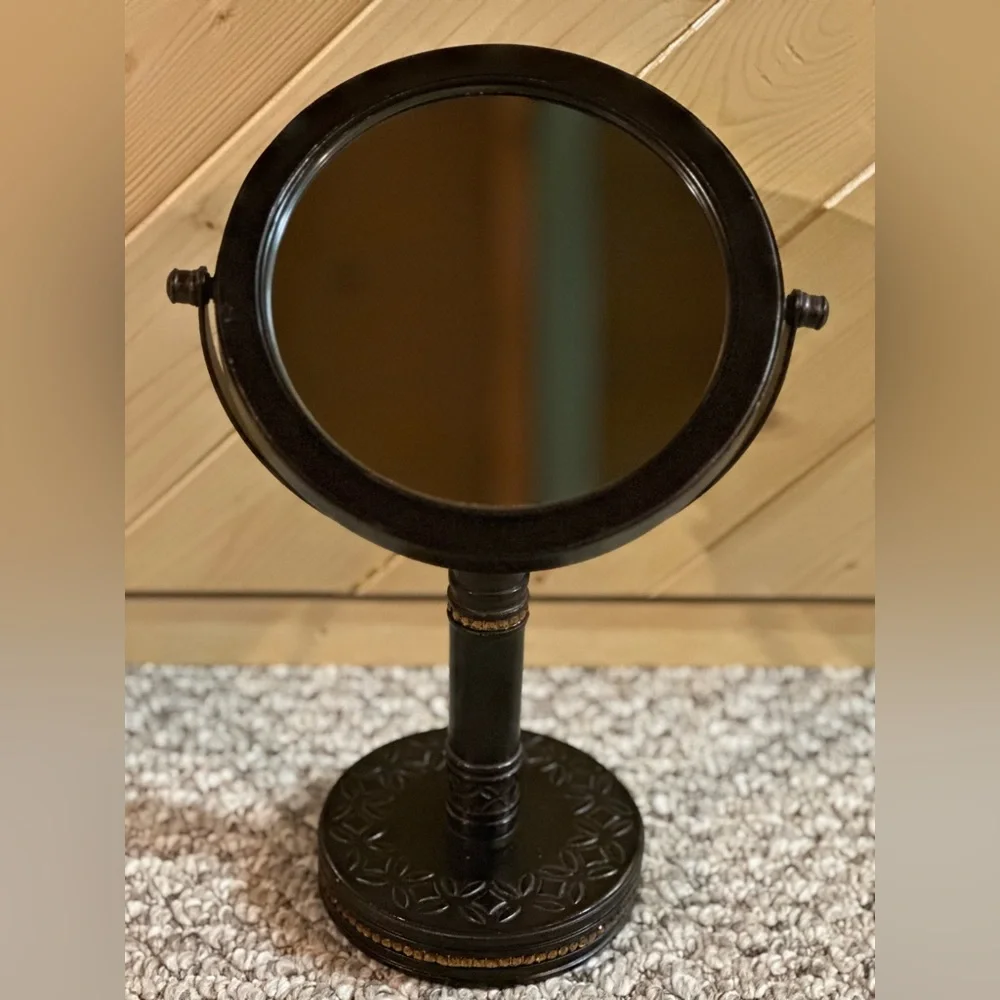 Bathroom countertop double sided magnification mirror.